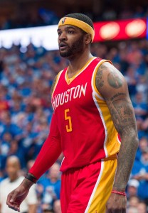 Apr 26, 2015; Dallas, TX, USA; Houston Rockets forward Josh Smith (5) waits for play to resume against the Dallas Mavericks in game four of the first round of the NBA Playoffs at American Airlines Center. The Mavericks defeated the Rockets 121-109. Mandatory Credit: Jerome Miron-USA TODAY Sports